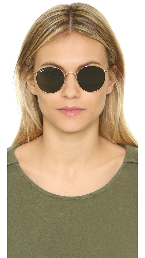 round ray-ban sunglasses with green lenses